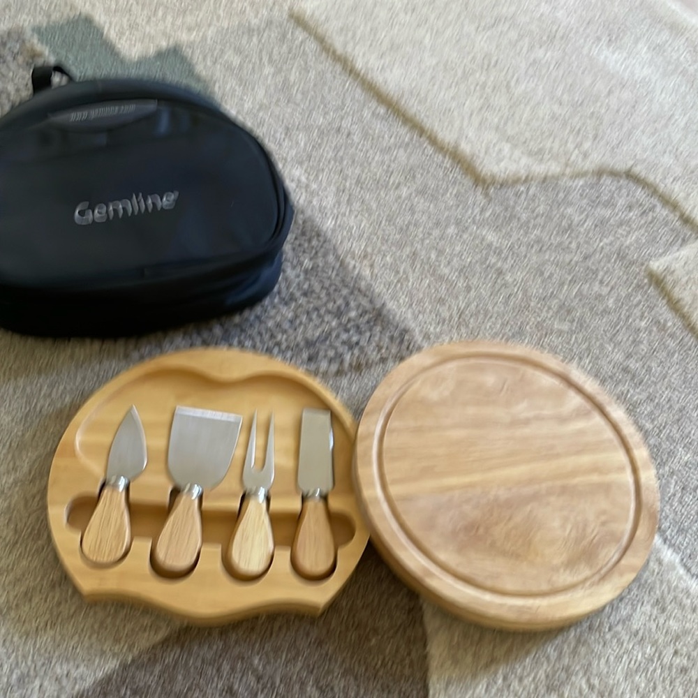 New travel cheese board with all utensils for picnic cheese etc